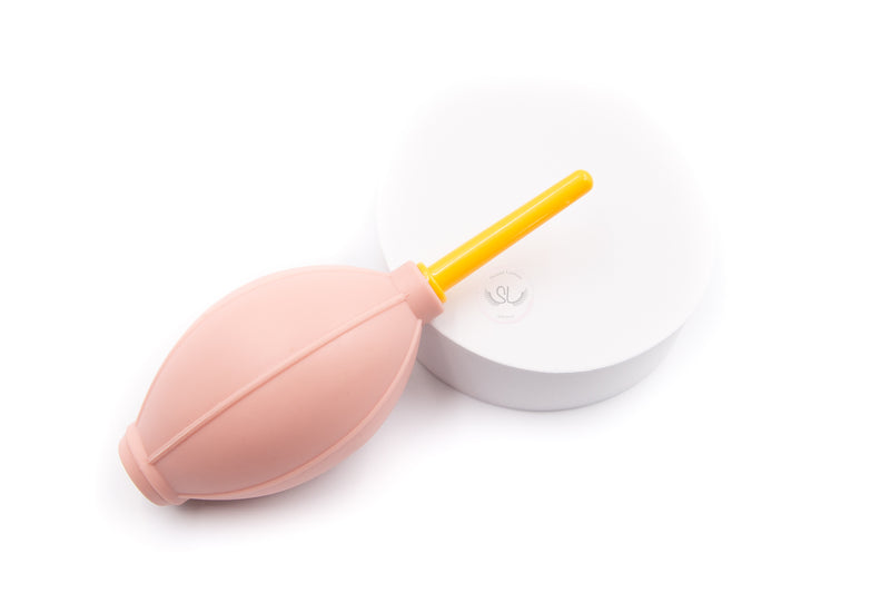 Air Blower/Puffer. - This blower has a soft rubber surface that easily creates air flows by gently squeezing the tool.  - It fits your hand nicely and helps to dry the eyelash extension glue quickly.  - It comes in five colours including Light Pink, Red, Blue, Green, and Black.  - Single pack